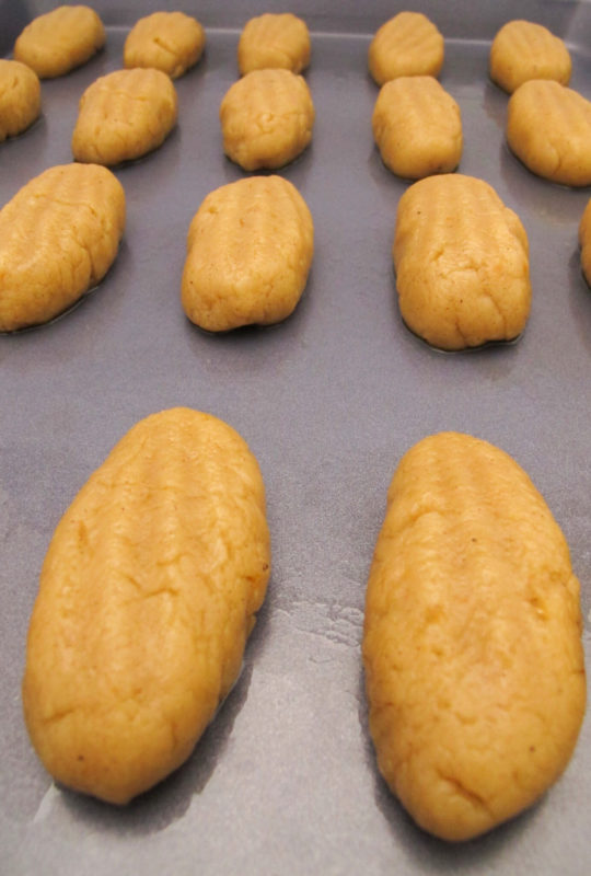 Greek honey cookies on a baking sheet before baking in the oven.