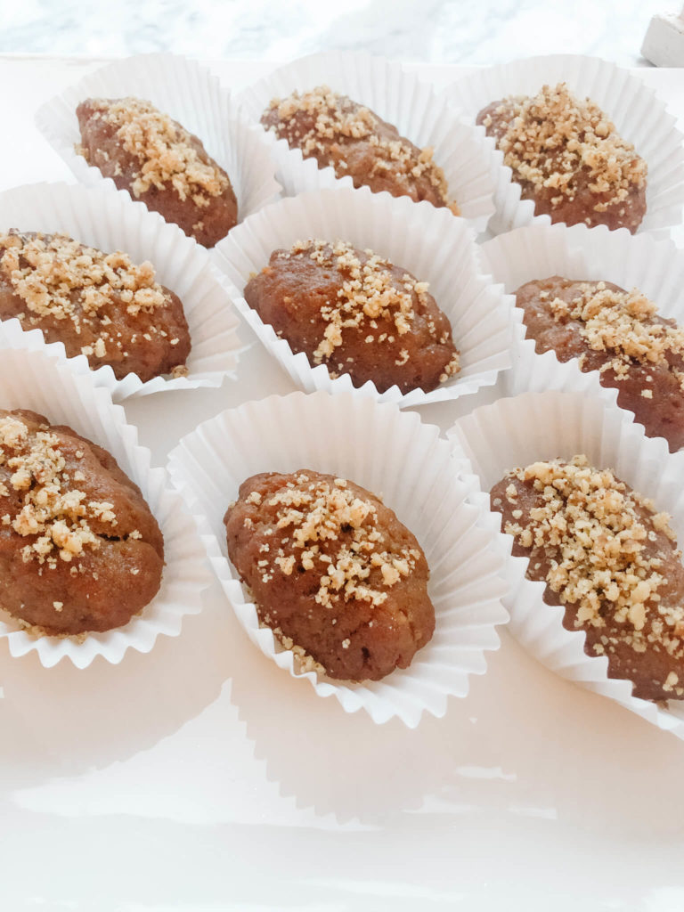 melomakarona with orange honey syrup and walnuts in individual wrappers