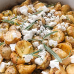 roasted tiny potatoes with crumbled feta cheese and rosemary