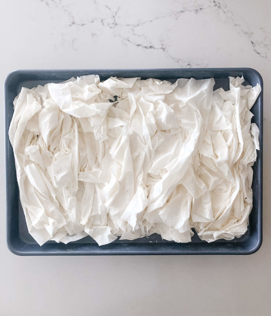phyllo sheets drying out on a baking sheet
