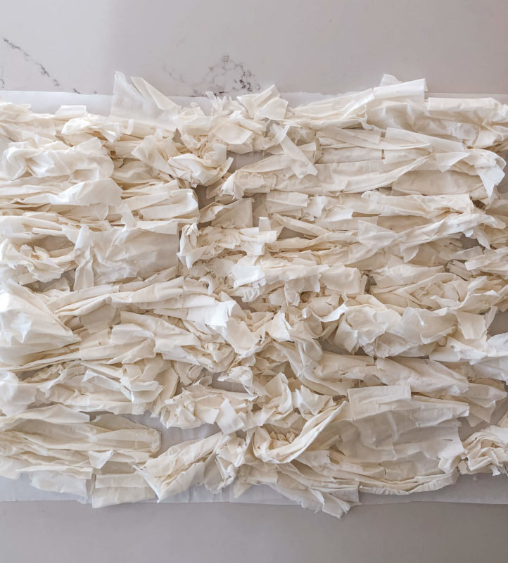 phyllo sheets drying out on a kitchen countertop