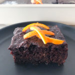 chocolate orange cake topped with fresh orange slices
