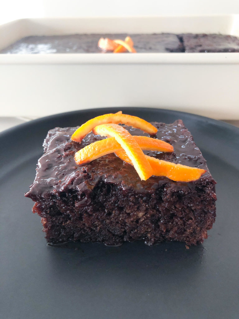 chocolate orange cake topped with fresh orange slices