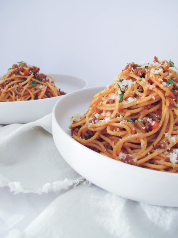 two bowls with spaghetti and homemade meat sauce