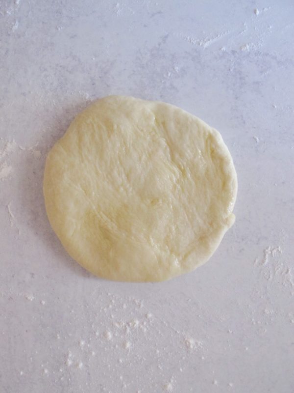 homemade phyllo dough rolled into a small circle.