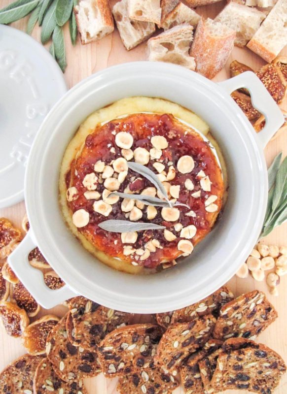 baked brie with fig jam, roasted hazelnuts, balsamic glaze, and fresh sage.