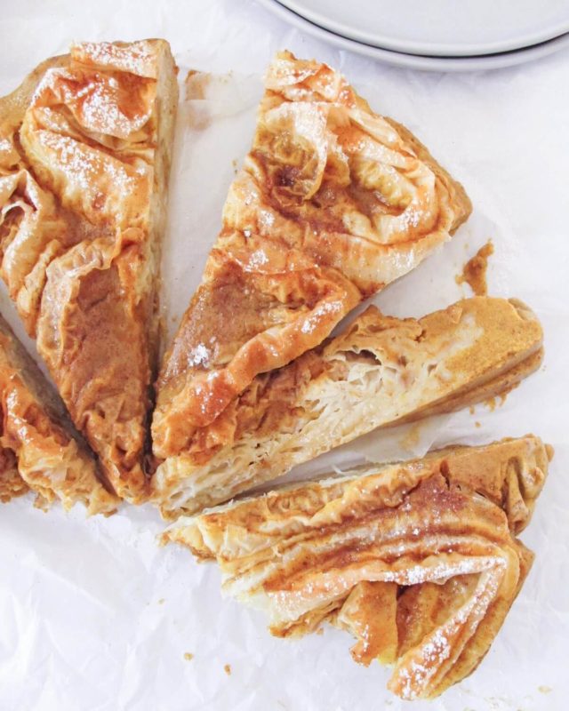 phyllo pumpkin pie slices on white parchment paper.