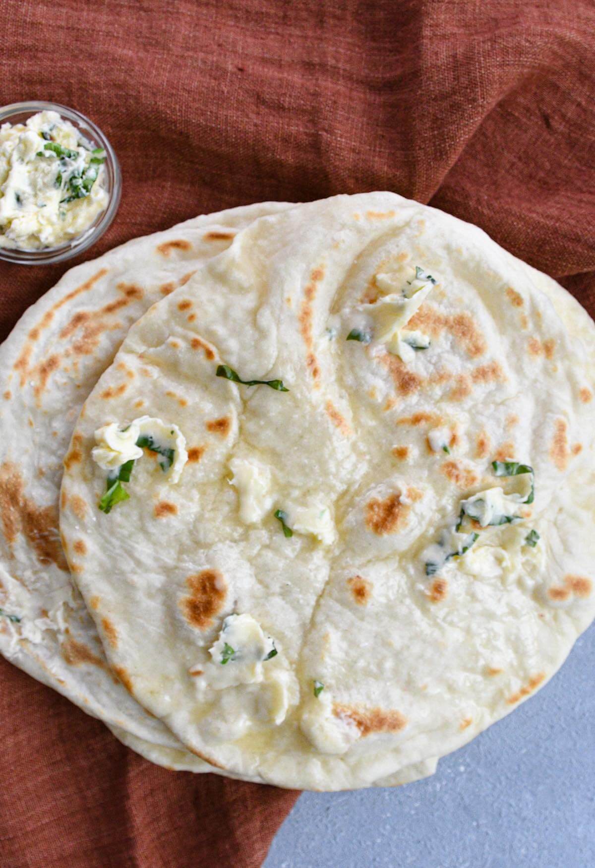 pita bread brushed with herb garlic butter.