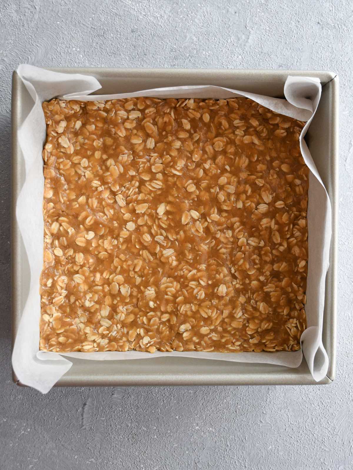 oatmeal crust pressed into an 8"x8" square baking pan.