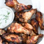 Greek chicken wings served with creamy ranch dill dip.