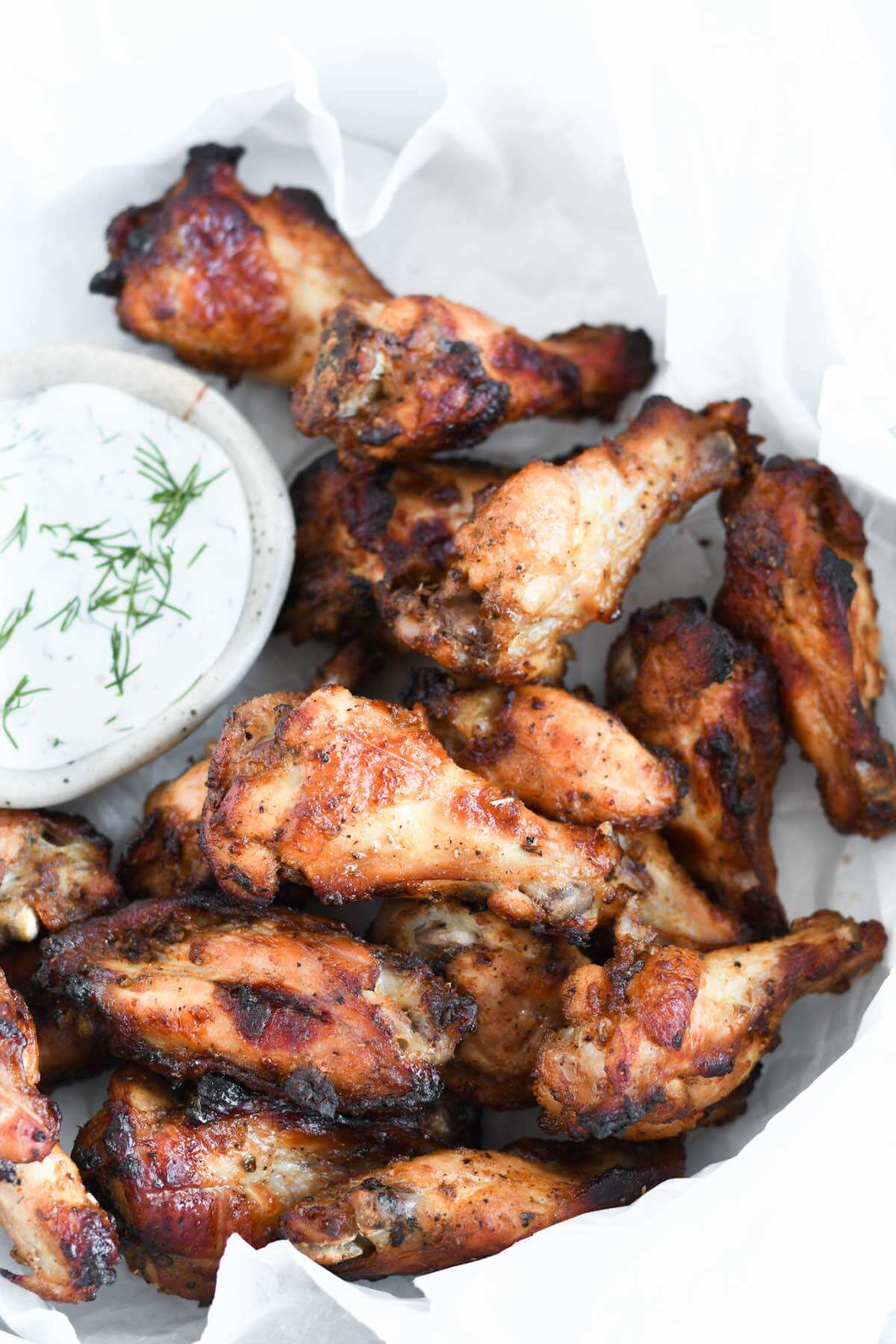 Greek chicken wings served with creamy ranch dill dip.